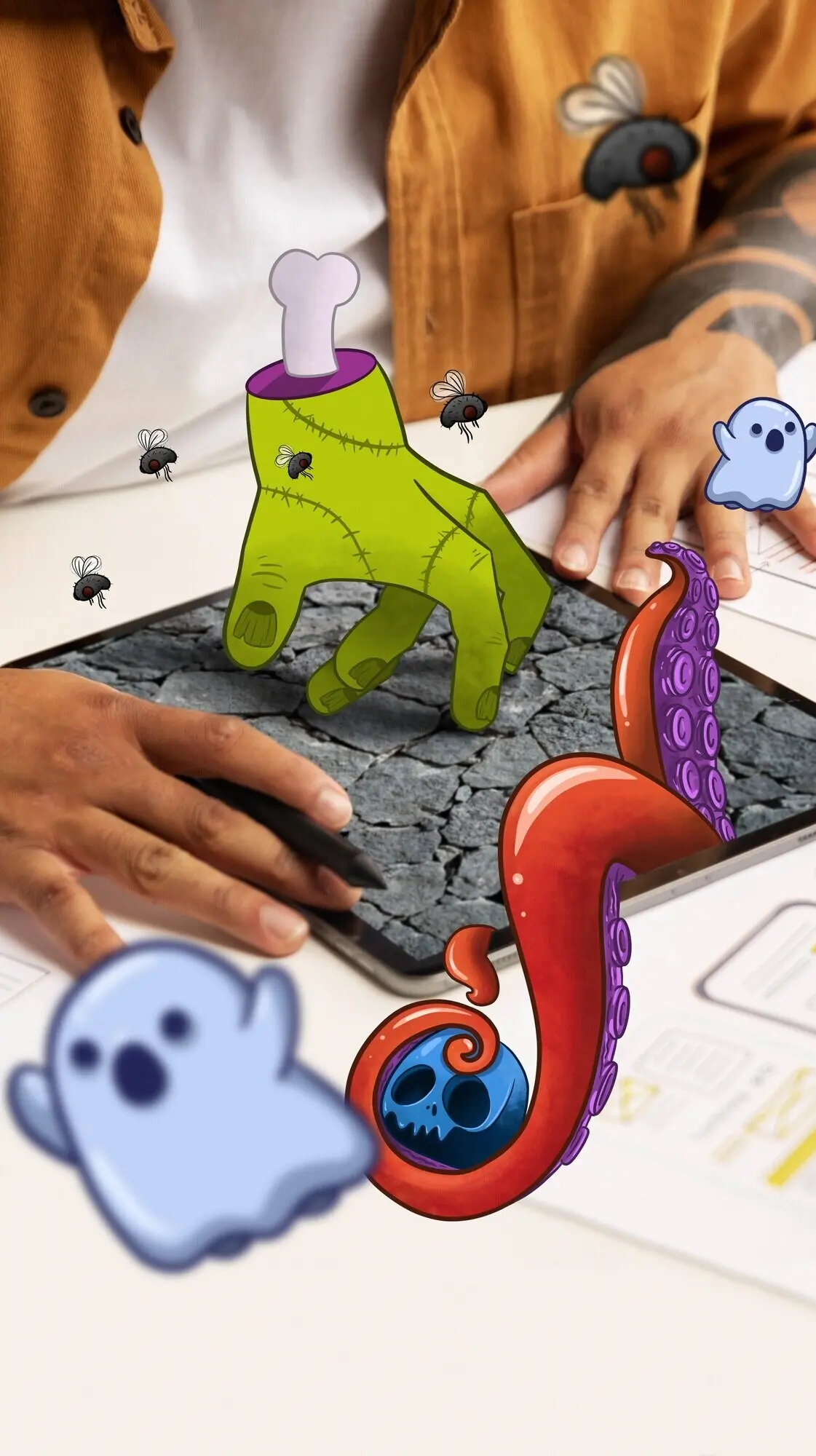 Иллюстратор рисует на iPad, вид сверху.